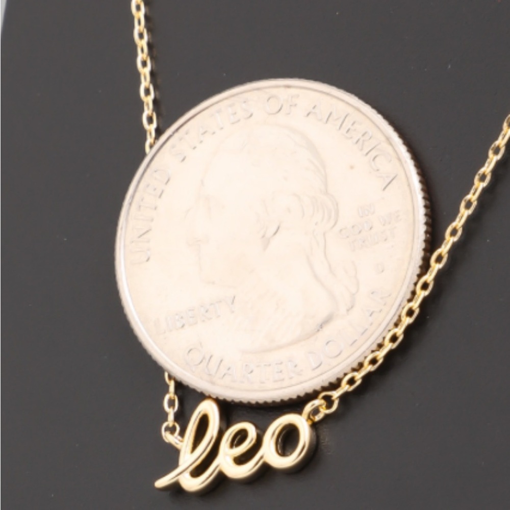 Gold zodiac pendant necklace in a fun font.  Makes a great gift.  18" - Picture 6 of 12